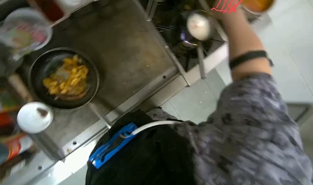 Adding ingredients to cooking pot: egocentric robotics sample