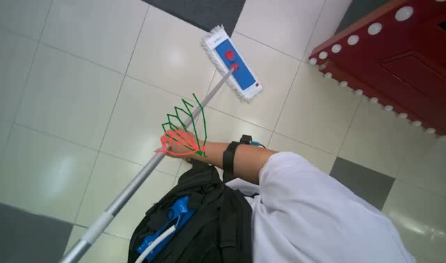 Mopping floor with flat mop: egocentric robotics sample