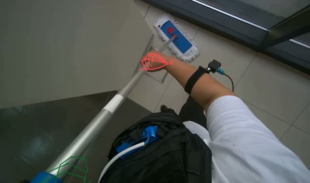 Mopping floor with flat mop: egocentric robotics sample