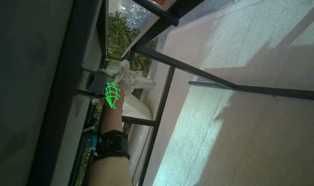 Wiping underside of outdoor table: egocentric robotics sample
