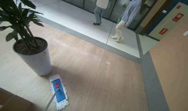 Mopping floor in hallway: egocentric robotics sample