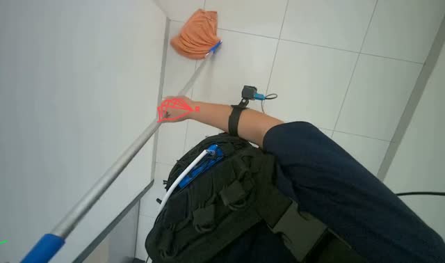Mopping tiled floor with string mop: egocentric robotics sample