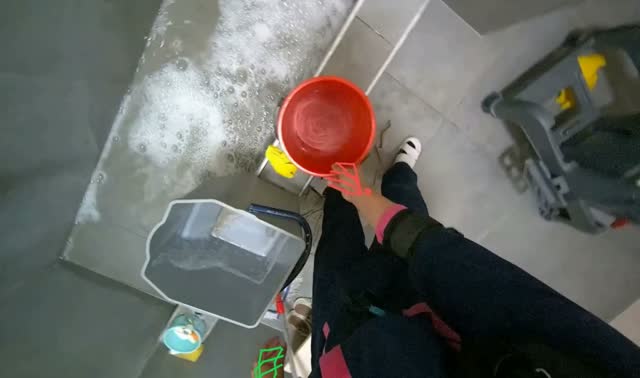 Emptying and rinsing mop buckets: egocentric robotics sample