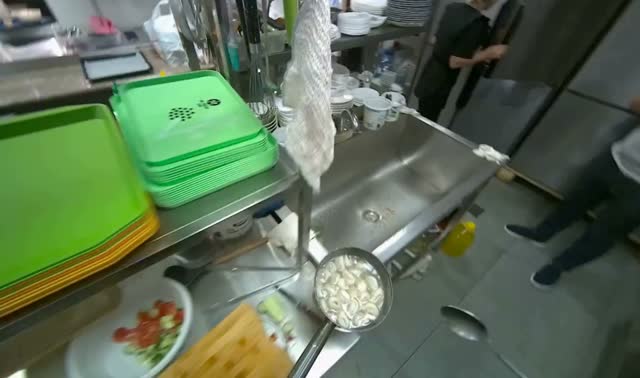 Scooping and draining dumplings: egocentric robotics sample