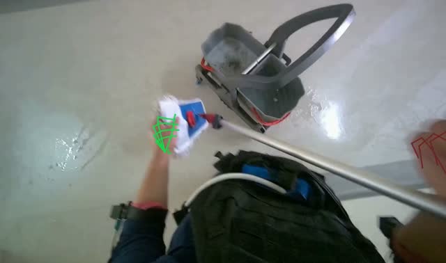 Wringing mop in bucket: egocentric robotics sample