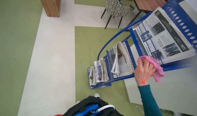 Wiping blue magazine rack: egocentric robotics sample