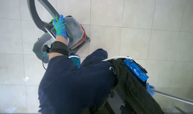 Preparing mop and cleaning cart: egocentric robotics sample