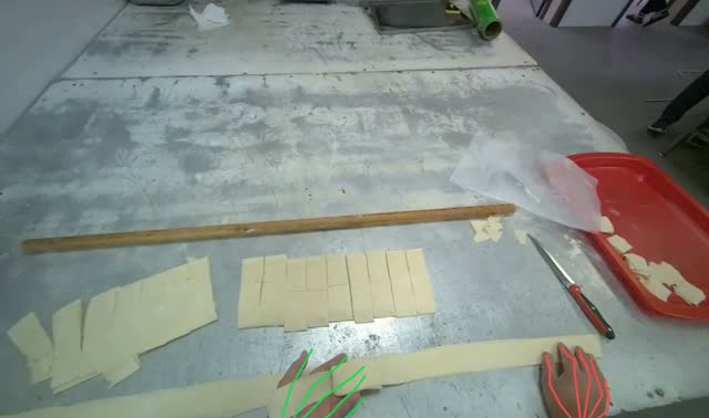 Preparing dough pieces on table: egocentric robotics sample