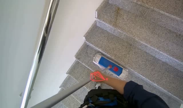 Mopping stairwell floor: egocentric robotics sample