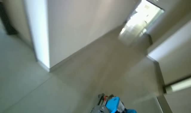 Mopping hallway floor: egocentric robotics sample