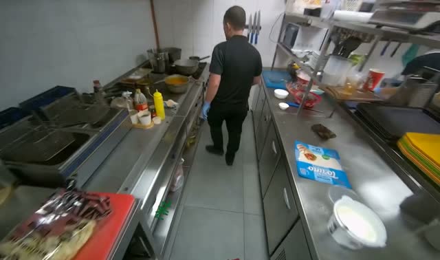 Stirring meal and taking noodles from bag: egocentric robotics sample