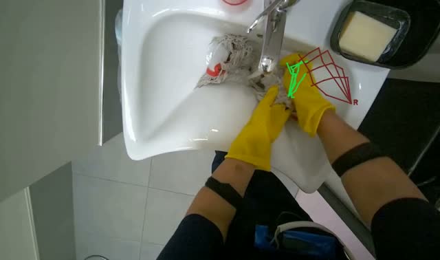 Cleaning mop head in sink: egocentric robotics sample