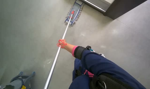 Mopping floor with flat mop: egocentric robotics sample