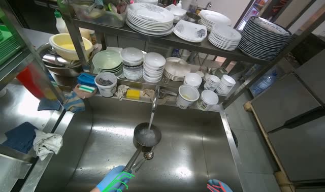 Placing water on stove to boil: egocentric robotics sample