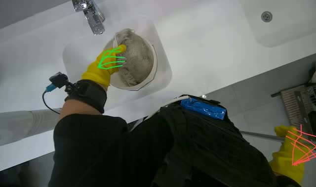 Cleaning and wringing mop head: egocentric robotics sample