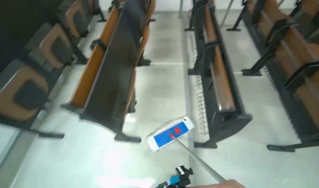 Mopping lecture hall floor: egocentric robotics sample
