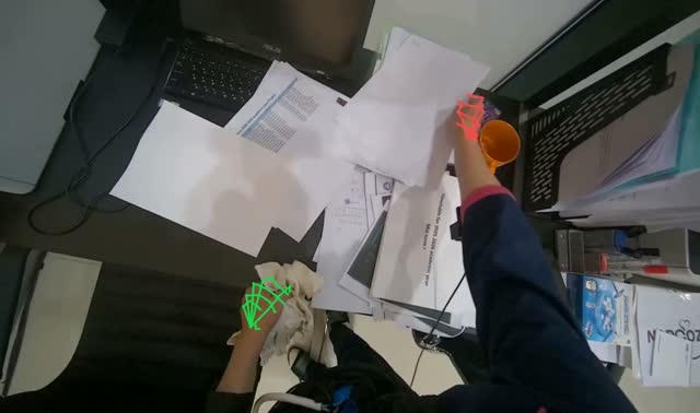 Organizing papers on desk: egocentric robotics sample