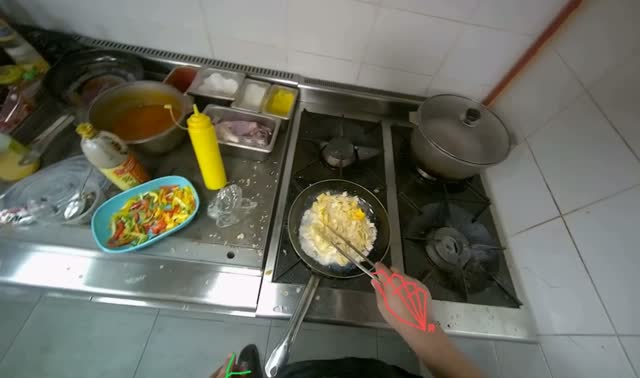 Stirring ingredients in pan: egocentric robotics sample