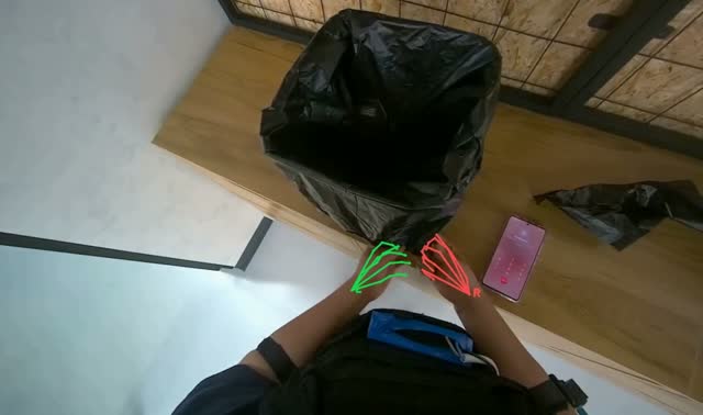 Lining trash bin with new bag: egocentric robotics sample