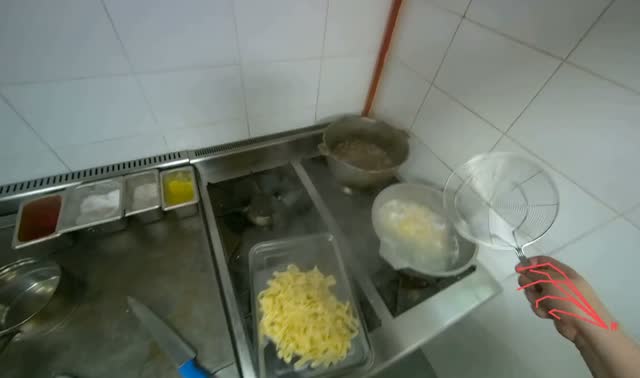 Removing cooked pasta from pot: egocentric robotics sample