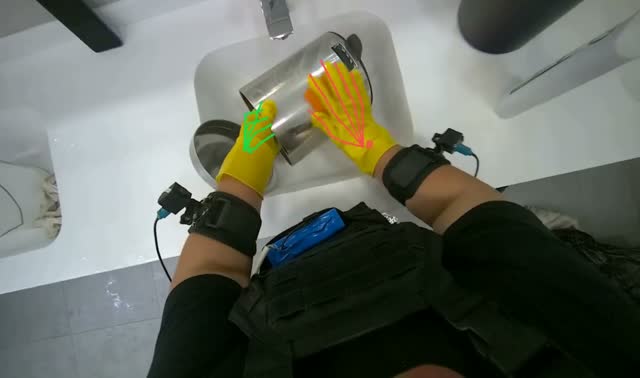Cleaning metal trash bin: egocentric robotics sample