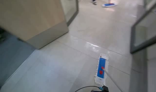 Mopping hallway floor: egocentric robotics sample