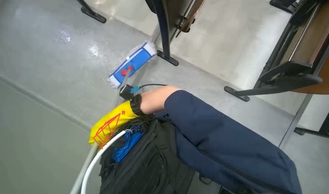 Mopping floor with flat mop: egocentric robotics sample
