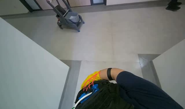 Mopping hallway floor: egocentric robotics sample