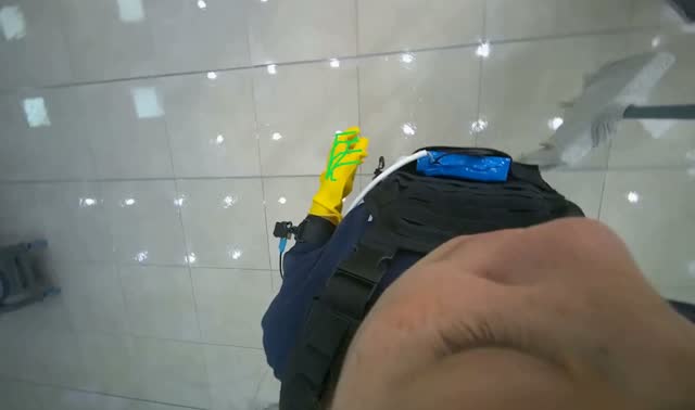 Mopping floor with mop: egocentric robotics sample