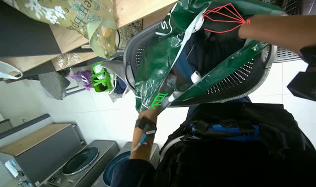 Bagging folded clothes into basket: egocentric robotics sample