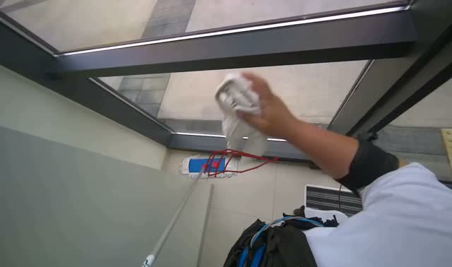 Wiping glass panel frame: egocentric robotics sample