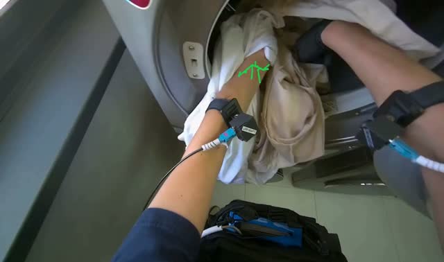 Operating laundry machines: egocentric robotics sample