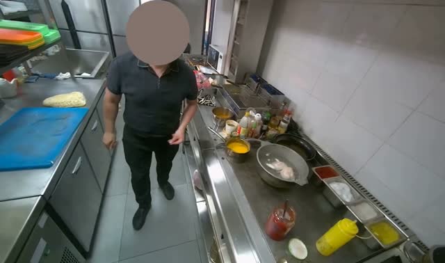 Adding and stirring vegetables in pot: egocentric robotics sample