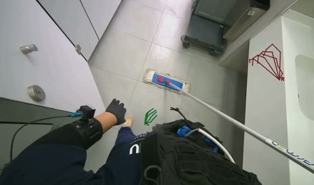 Mopping restroom floor: egocentric robotics sample