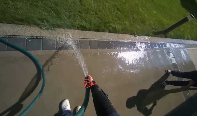 Rinsing concrete ground: egocentric robotics sample