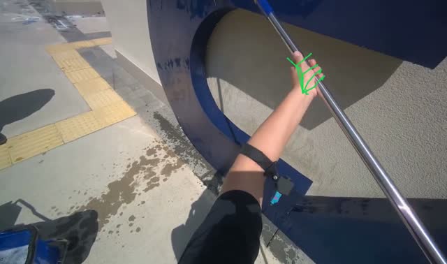 Scrubbing large blue letter C: egocentric robotics sample