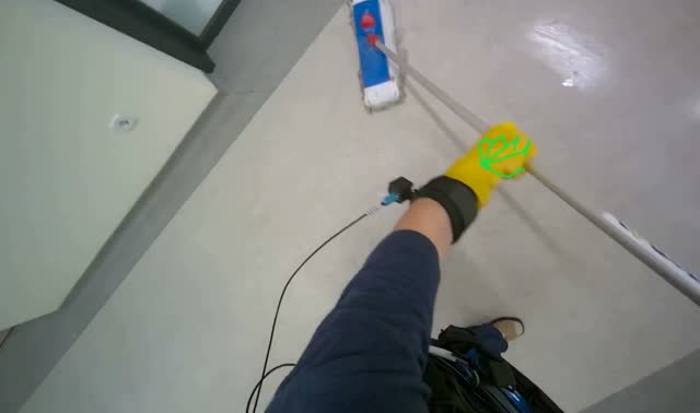 Mopping light-colored floor: egocentric robotics sample