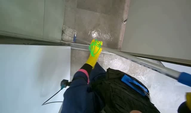 Mopping shower floor: egocentric robotics sample