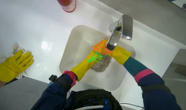 Washing mop head in sink: egocentric robotics sample