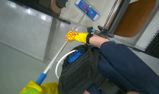 Mopping floor with mop: egocentric robotics sample