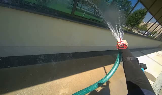 Spraying water on building windows: egocentric robotics sample