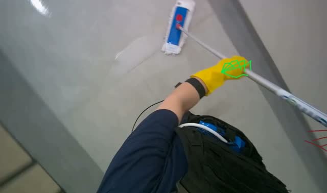 Mopping floor with flat mop: egocentric robotics sample