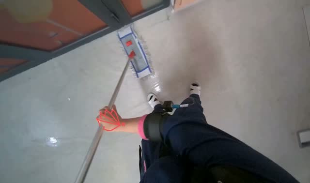 Mopping hallway floor: egocentric robotics sample