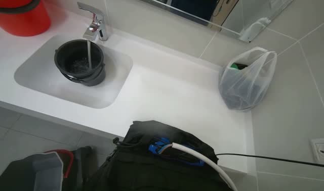 Preparing cleaning solution in cart: egocentric robotics sample