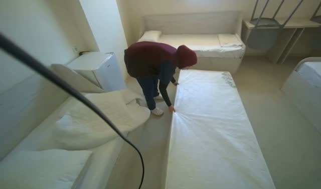 Placing mattress and protector on bed: egocentric robotics sample