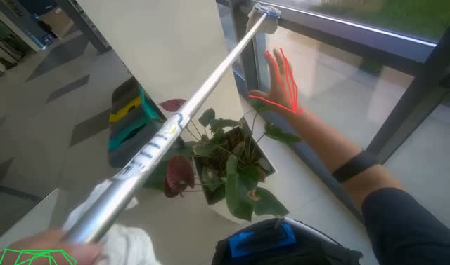 Cleaning glass windows with mop: egocentric robotics sample