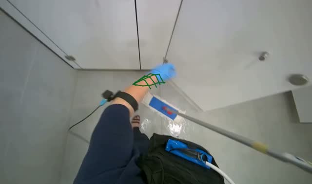 Mopping restroom floor: egocentric robotics sample