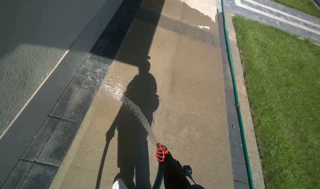 Rinsing concrete ground: egocentric robotics sample