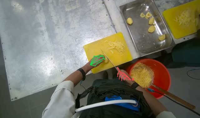 Slicing potatoes on cutting board: egocentric robotics sample