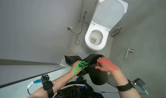 Collecting trash from restroom bins: egocentric robotics sample